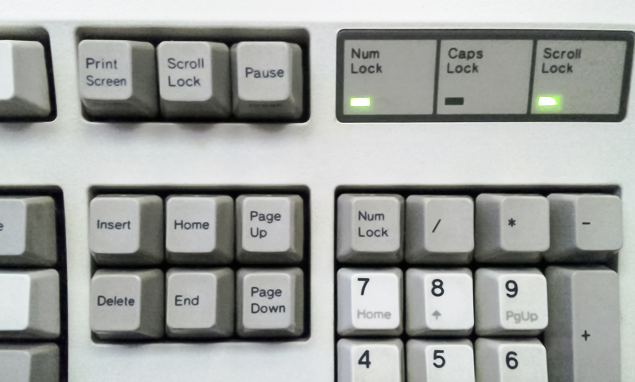 Keyboard with arrows pointing up and down