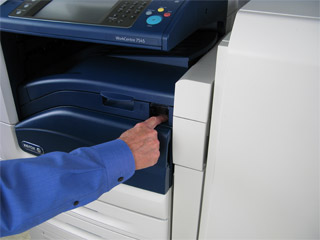 Turn off the printer and unplug it from the power source.
Open the printer's main cover and locate the print carriage.